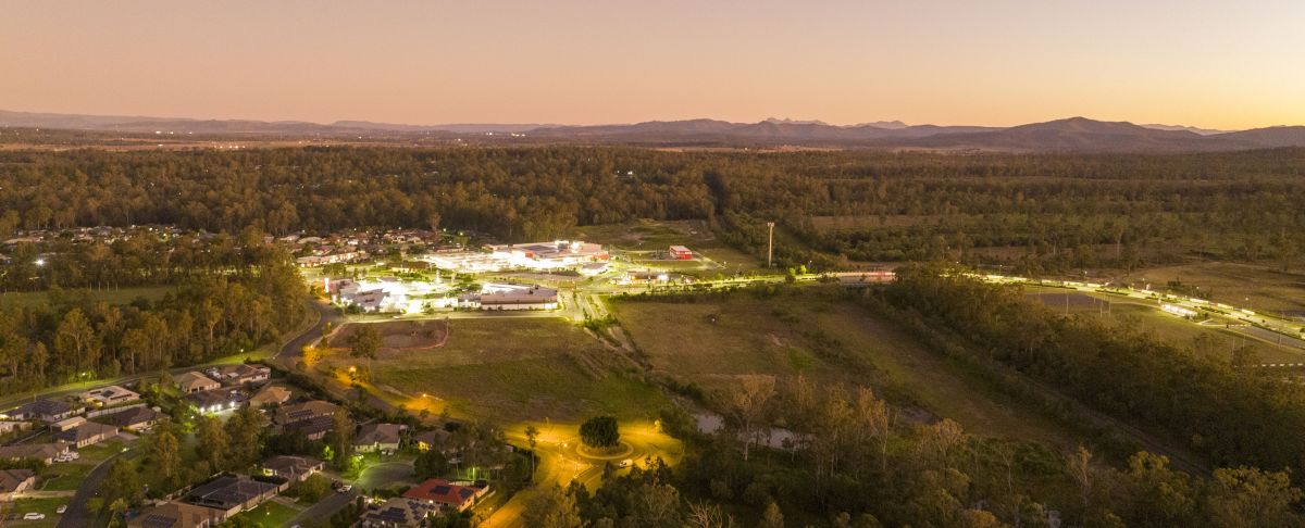 An aerial view of the City of Logan at dusk