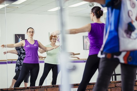 Group doing cardio Barre
