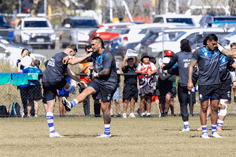 New Zealand Warriors players train at Logan Metro as fans watch on