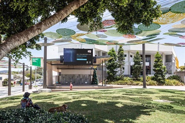 Large screen mounted on side of building