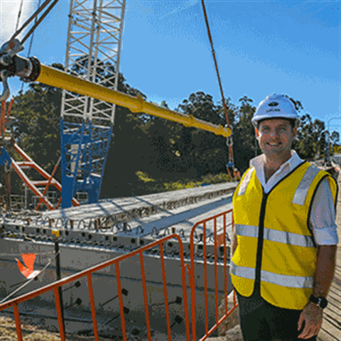 JADU_Mayor_Jon_Raven_at_the_Loganlea_Rd_bridge_installation.gif