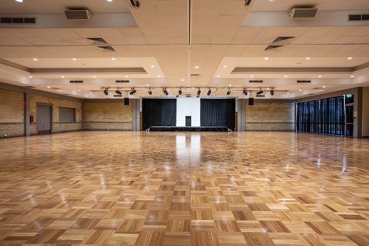 Large auditorium with polished wooden floors