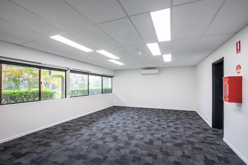 Meeting room with row of windows and grey multi coloured carpet