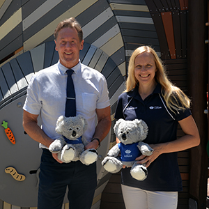 An image of Mayor Darren Power and Division 10 Cr Miriam Stemp holding toy koalas as they get into the nature theme to celebrate the opening of the $6.4 million upgrade of Alexander Clark Park in Loganholme.