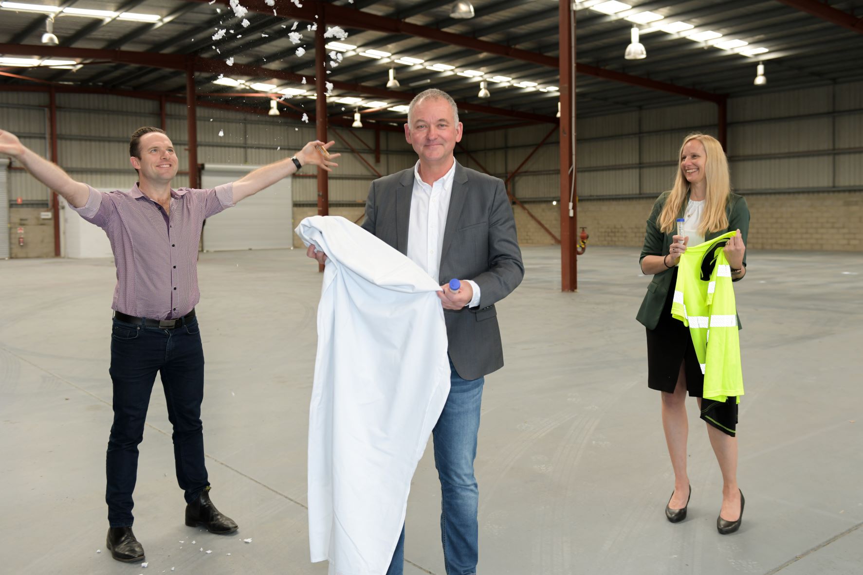 Deputy Mayor Jon Raven with BlocTexx co-founder Graham Ross and local Councillor Miriam Stemp at the company's new headquarters in Loganholme