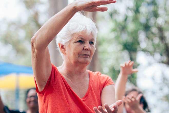 A lady doing tai chi.