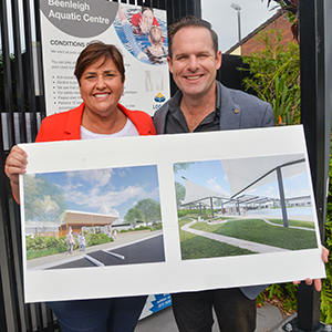 Mayor Jon Raven and Division 12 Councillor Karen Murphy with renders of the new Beenleigh Aquatic Centre, which will be constructed over the next year.