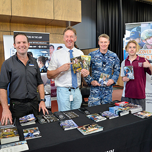 Mayor Darren Power (centre left) and Cr Jon Raven with Air Force Sergeant Benjamin Rogers and year 11 Beenleigh State High School student Deegan Byford at the Bridge to Business event.