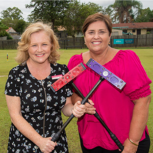 City Lifestyle Chair, Councillor Laurie Koranski and Division 12 Councillor Karen Murphy try their hand at croquet in Bedford Park at Eagleby.