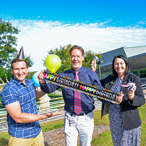 Mayor Darren Power (centre), Lifestyle Chair Cr Tony Hall and Division 2 Cr Teresa Lane look forward to celebrating the Logan Entertainment Centre's 21st birthday in July.