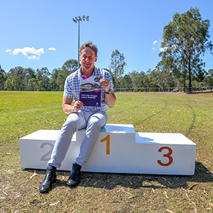 Mayor Darren Power, pictured at the Springwood Sharks Little Athletics centre, wants to hear the community’s ideas on positioning the City of Logan for Olympic success.