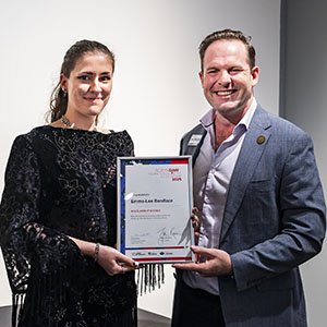 A photograph of Mayor Jon Raven with 2025 Robyn Daw Young Visual Artist Scholarship recipient Emma-Lee Boniface.