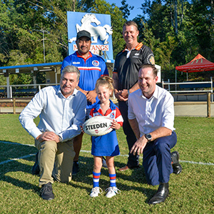 City of Logan Mayor Jon Raven (bottom right) with Deputy Mayor and Division 9 Councillor Scott Bannan (top right), Logan MP Linus Power (bottom left), Mustangs president Johnny Peseta and future Mustang Patience Roil, 5, of Logan Reserve.