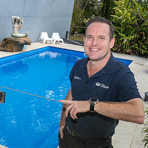 Man stands near pool