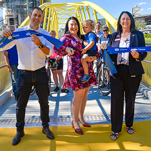 (From left) Federal Treasurer Jim Chalmers, Division 3 Councillor Mindy Russell and Infrastructure Chair Councillor Teresa Lane are joined by young Slacks Creek resident Harrison-Ford Tawse, 2, for the opening of the Slacks Track pathway.