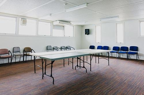 White room with wooden floor boards