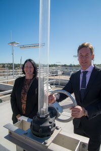 Mayor turning wheel on new treatment plant