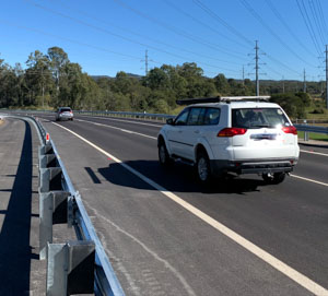 Cars travelling on New Beith Road