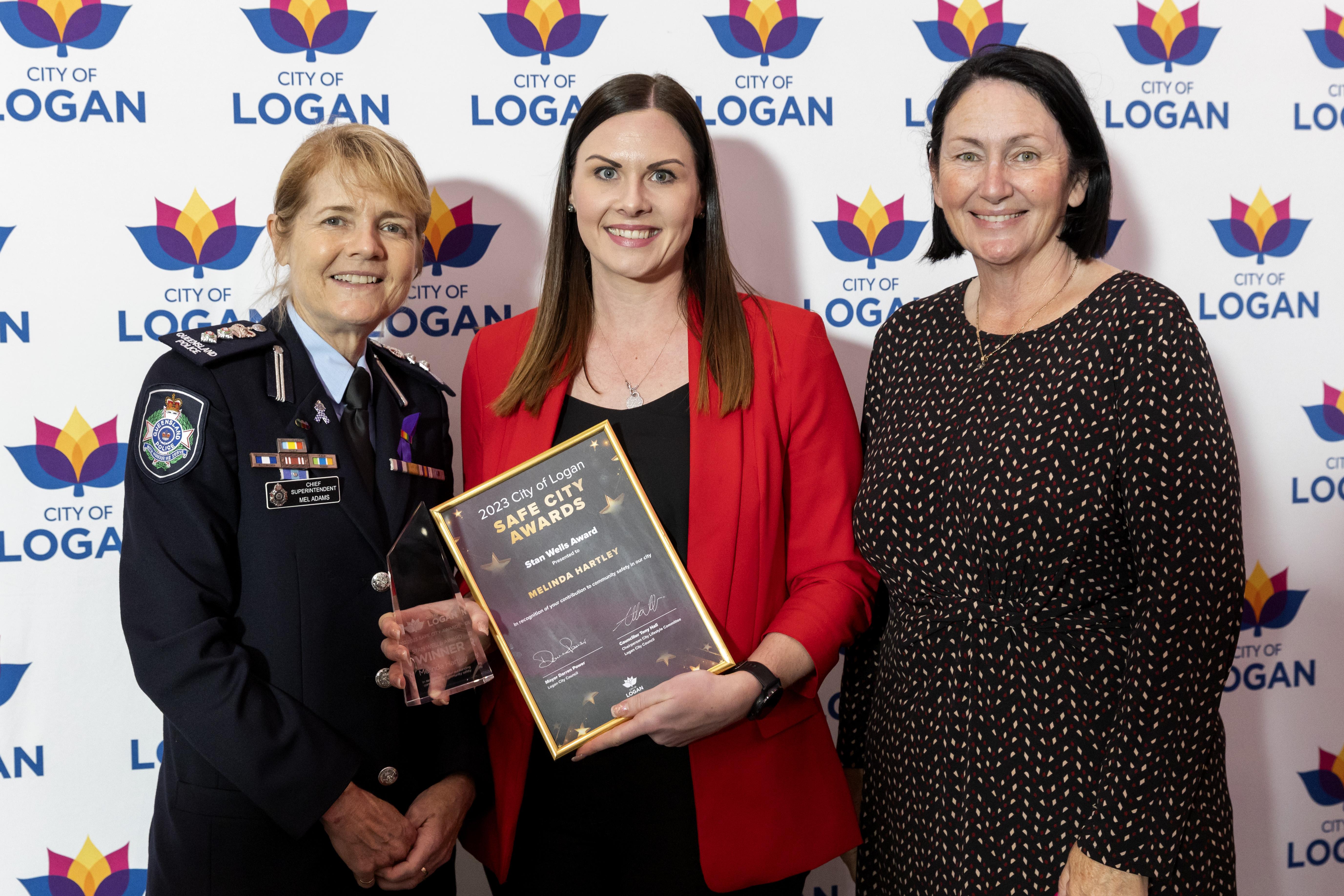 Stan Wells Award recipient Melinda Hartley with Chief Supt. Mel Adams and Cr Teresa Lane at City of Logan Safe City Awards