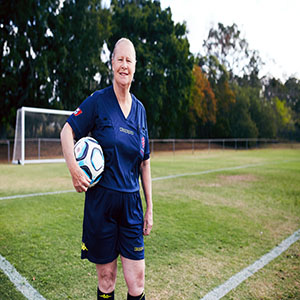 This is a photo of a sportswoman holding a ball.