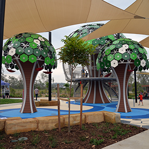 An image of the treehouse structures at the Flagstone water play area.