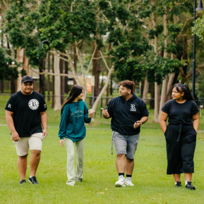 four people walking together