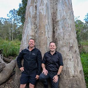 Division 9 Councillor Scott Bannan and Environment Chair, Councillor Jon Raven with a new giant of the forest at Jimboomba.