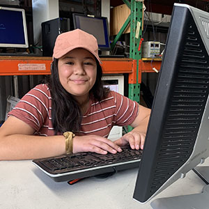 Ella Misisa, 10, of Slacks Creek has received a refurbished computer to assist with her online schooling.