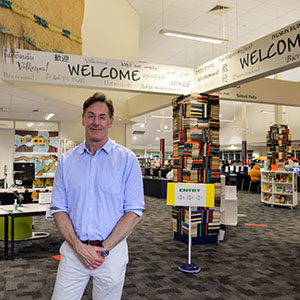 This is a photograph of City of Logan Mayor Darren Power at the Logan Central Library. Logan's libraries received high customer satisfaction ratings in the 2020 Logan Listens: Residents' Survey.