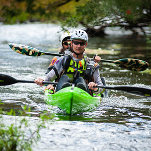 An image of Rogue Raid competitors kayaking.