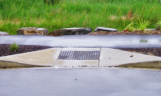 Picture of a kerb ramp for wheelchair access from the road to the footpath