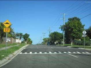 picture of a speed hump in the road