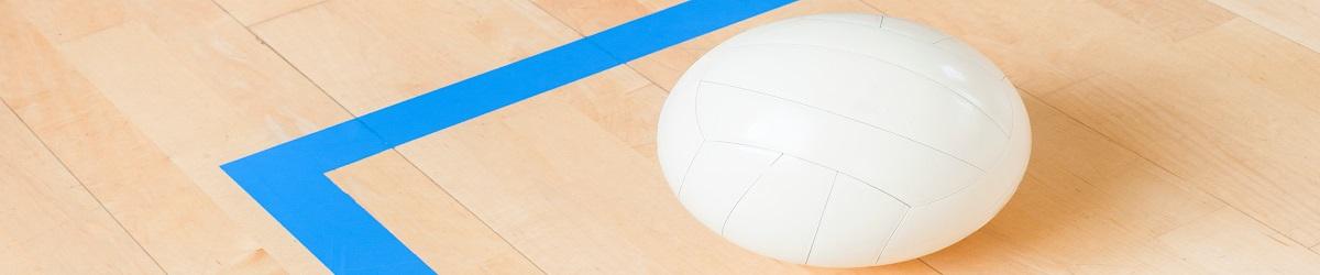 Picture of volleyball placed in corner of court