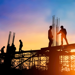 An image of construction workers at sunset to show The City of Logan will use  the latest State funding to help create jobs and boost business and construction.