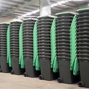 An image of green waste bins stacked in a warehouse showing preparations are on track for City of Logan's new green waste bin
service starting in July.